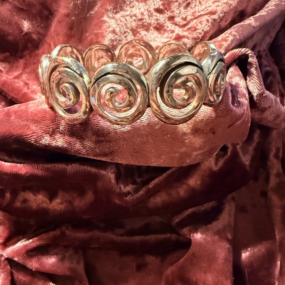 Elegant Silver Tone Swirl Bracelet